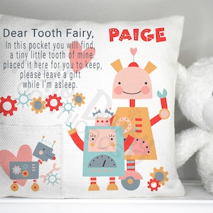 May include: White pillow with a pocket, featuring a colorful robot design and the text "Dear Tooth Fairy, In this pocket you will find, a tiny little tooth of mine. I placed it here for you to keep, please leave a gift while I'm asleep." and the name "PAIGE".