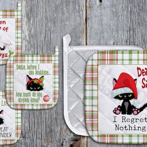 May include: Set of four black cat themed Christmas pot holders. The pot holders feature a red and green plaid design with black cats wearing Santa hats and Christmas lights. The text on the pot holders reads "It's been one of those days", "Santa, before I say anything... how much do you already know?", "Naughty List Repeat Offender", and "Dear Santa, I Regret Nothing".