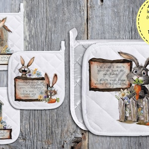 May include: Set of four white cotton pot holders with a quilted texture. Each pot holder features a cartoon bunny with a different humorous saying. The sayings are: "Dust Bunnies are my decorating style", "Dinosaurs didn't eat chocolate - now they're gone. Coincidence? I'm not taking any chances!", "Does running late count as exercise?", and "I'm glad I don't have to hunt my own food. I don't even know where cookies live."