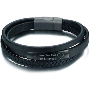 May include: Black leather bracelet with a braided design and a metal plate engraved with the words "Love You Dad Pam & Mathew" along with a cross and heart symbol.