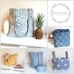 May include: A collection of six different tote bags with various patterns and colors. The bags are made of fabric and have a variety of designs, including leaves, stars, and geometric patterns. The bags are all handmade and are perfect for carrying everyday essentials.