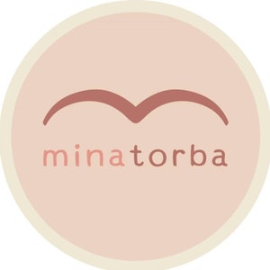 May include: A pink circle with a cream border and a brown stylized bird shape above the text "minatorba".