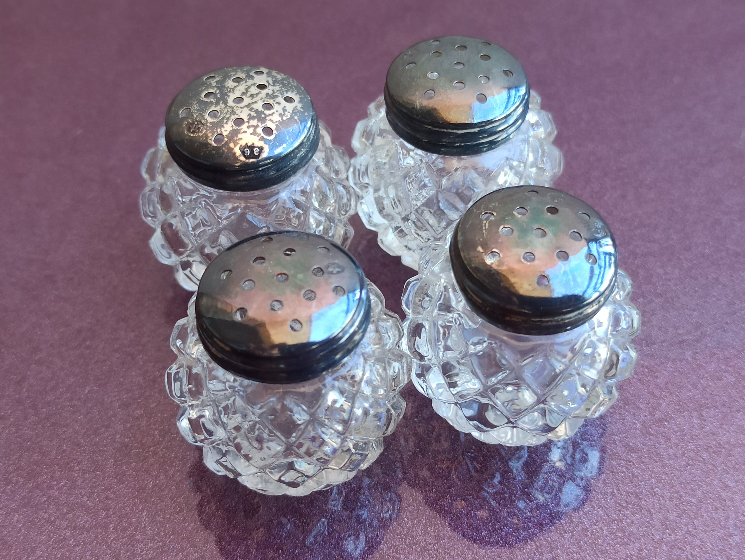 Pretty Glass Salt and Pepper Shaker Set With Fancy Silver Shaker Tops 