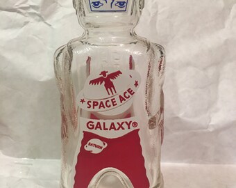 Astronaut Space Warrior Galaxy Glass Syrup Bottles Vintage Spaceman Glass Bank Yellow Interplanetary Commander New Old Stock