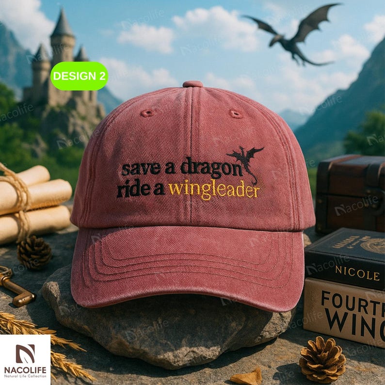 May include: A maroon baseball cap featuring the embroidered text "save a dragon ride a wingleader" in black and gold, with a dragon graphic. The cap has a classic six-panel design.