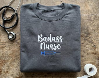Embroidered Badass Nurse Sweatshirt, Funny RN Hoodie, Syringe Medical Apparel, Nursing School Grad Gift