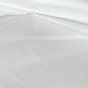 May include: White fabric with smooth texture and subtle wrinkles, creating a soft, flowing effect.
