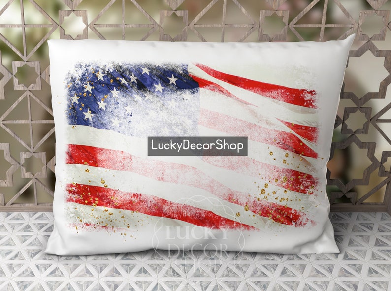 May include: White pillow with a distressed American flag design in red, white, and blue with gold glitter accents. The text "LuckyDecorShop" is printed on the pillow.