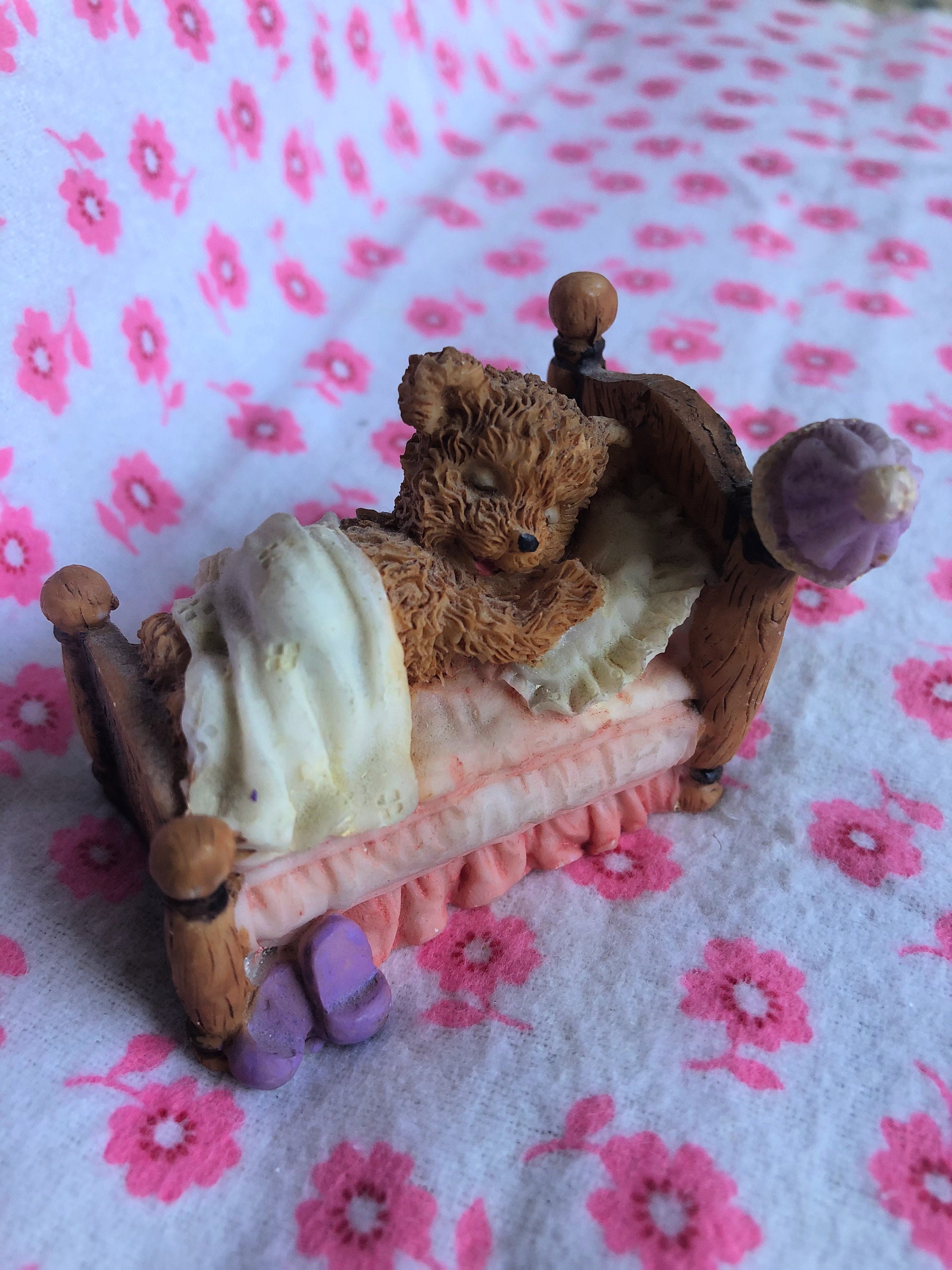 teddy bear in bed