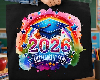 May include: Black tote bag featuring a colorful design for the Kindergarten Graduating Class of 2026. The design includes a graduation cap, rainbow, stars, and the text "2026 Kindergarten Grad".