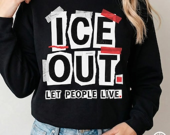 May include: Black sweatshirt with the words "ICE OUT" in large white block letters, accented with red tape and the phrase "LET PEOPLE LIVE" in white. The sweatshirt is a casual style.