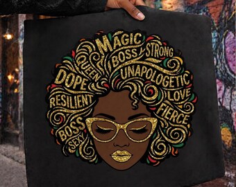 May include: Black square pillow featuring a stylized illustration of a woman with gold-glittered hair and glasses. The hair design includes the words "Magic, Boss, Strong, Unapologetic, Love, Fierce, Queen, Dope, Resilient, Boss, Sexy."