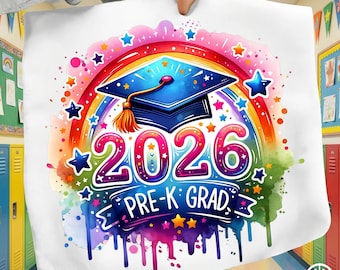 May include: A white tote bag featuring a colorful design for the Pre-K graduating class of 2026. The design includes a graduation cap, rainbow, stars, and the text "2026 PRE-K GRAD". The design has a watercolor effect.