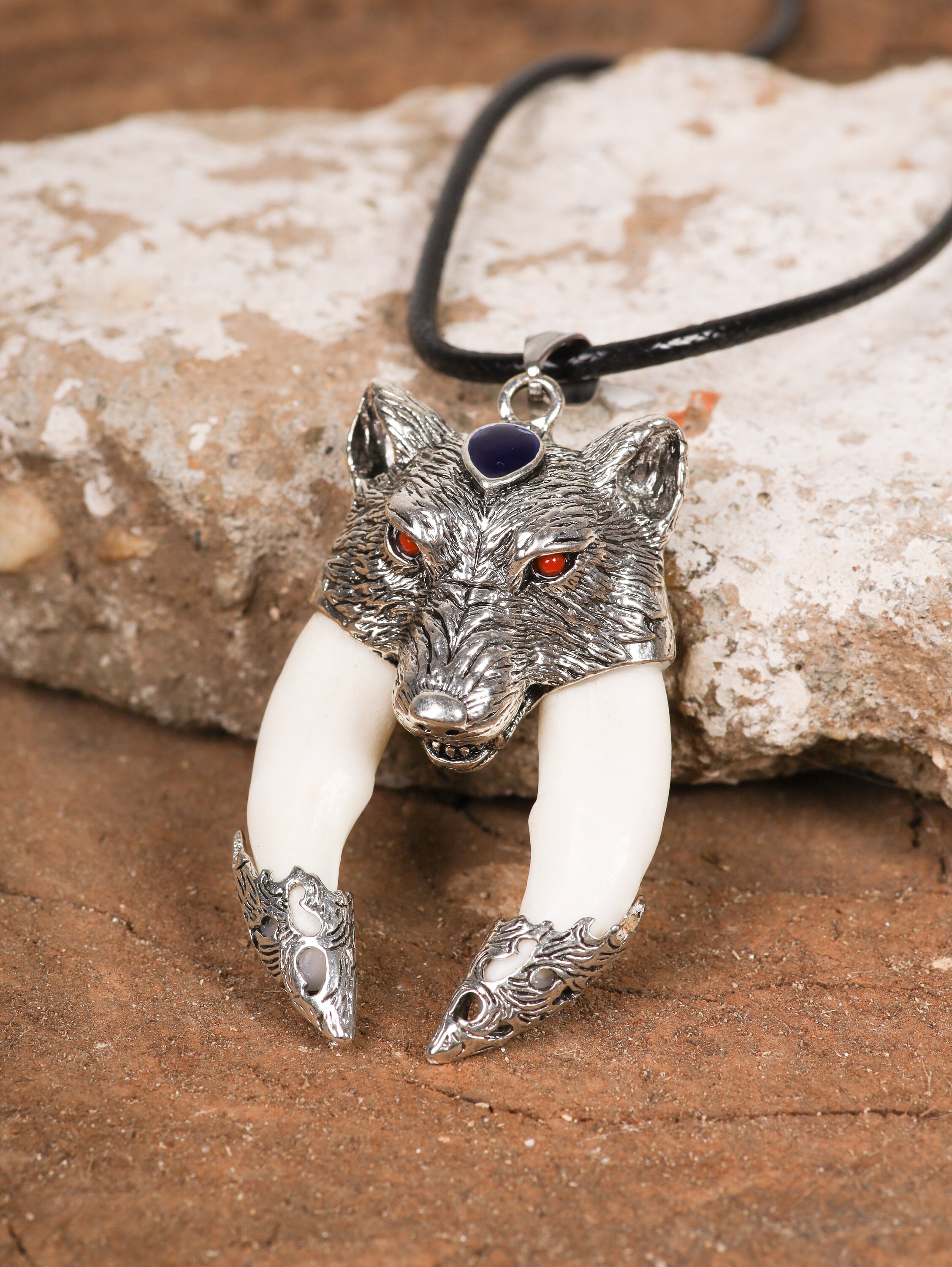 Unleash Your Inner Warrior with the Engraved Viking Wolf Fang Necklace -  Tap into Ancient Wisdom and Courage Shop Now!