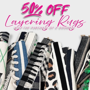 a pile of shoes with a sale tag on it
