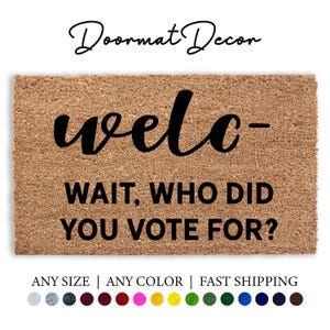 May include: A brown coir doormat with the text "welo- WAIT, WHO DID YOU VOTE FOR?" in black lettering. The doormat is available in any size and color.