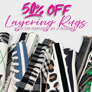 a pile of shoes with a sale tag on it