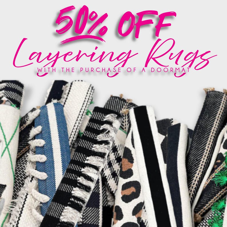 a pile of shoes with a sale tag on it