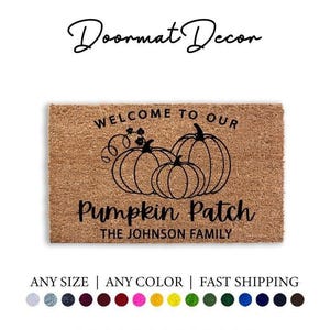 May include: A brown coir doormat with the text "Welcome to our Pumpkin Patch The Johnson Family" in black lettering. The doormat features a black silhouette of three pumpkins with vines.