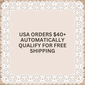 May include: A square graphic with a light beige center and a white intricate lace-style border. The text in the center reads: USA ORDERS $40+ AUTOMATICALLY QUALIFY FOR FREE SHIPPING. The design is set against a light wood grain background.