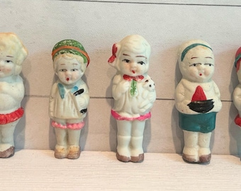 Antique Bisque Porcelain Penny Dolls in Original Box, Set of 5.