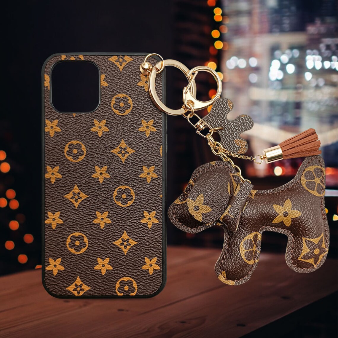 A mobile phone case with a cute puppy charm keychain suitable Etsy