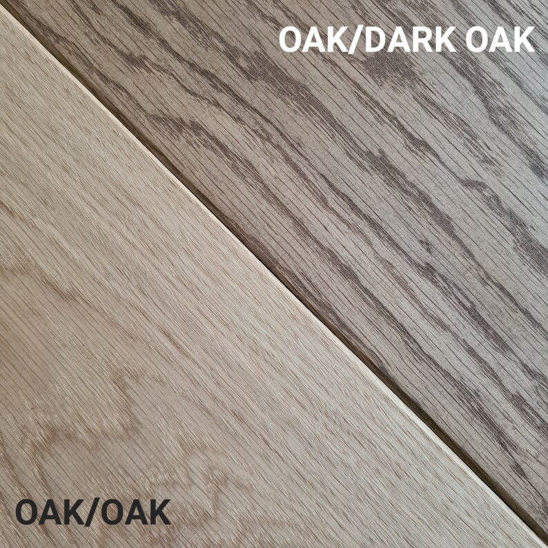 May include: Two samples of wood flooring, divided diagonally. One section is light oak, the other is dark oak. The text "OAK/DARK OAK" and "OAK/OAK" are printed on the image.