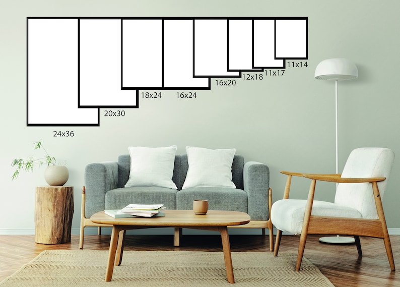 May include: A wall with a variety of black framed prints in different sizes. The prints are arranged in a row from largest to smallest. The largest print is 24x36 inches, and the smallest print is 11x14 inches. The prints are all white and have a simple, modern design.