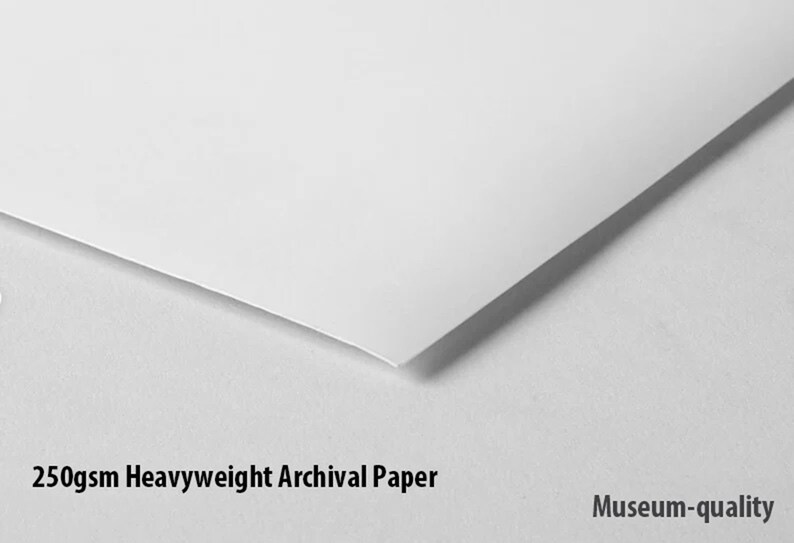 May include: Close-up of a white, 250gsm heavyweight archival paper. The paper is smooth and has a slight sheen. The text "Museum-quality" is printed below the paper.
