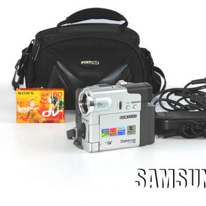 Film Cinema Filming  apparatus Video Camera SAMSUNG VP-D325 Lens 10X ZOOM f = 2.7 - 27 mm F : 1.4  Made in Japan