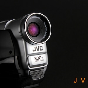 Film Cinema Filming  apparatus Video Camera JVC  GR-SX27E Lens 25 x Optical ZooM/Af F = 2.2-55mm