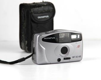 Appareil Photo Olympus OM 101 35mm Avec Objectif 35-70mm F/3.5-4.5, Occasion Fonctionnel