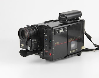 Cine Aparato de filmación Cámara de video SHARP Entrada DC Lente AF Enfoque automático Fabricado en Japón
