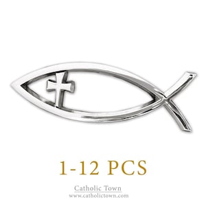 May include: Silver-toned metal Christian fish symbol with a cross cutout. The symbol is available in quantities of 1-12 pieces. Catholic Town, www.catholictown.com