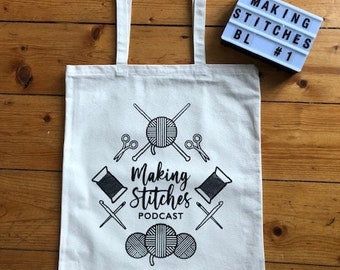 Bolsa de proyecto de lona de algodón serigrafiada con el logotipo de Making Stitches Podcast (negro 1)