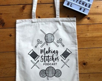 Bolsa de proyecto de lona de algodón serigrafiada con el logotipo de Making Stitches Podcast (negro 2)
