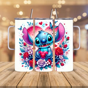 May include: Three white stainless steel tumblers with a cartoon Stitch design. The design features Stitch holding a heart, surrounded by red roses, butterflies, and a pink heart background. Each tumbler has a silver straw and a white handle.