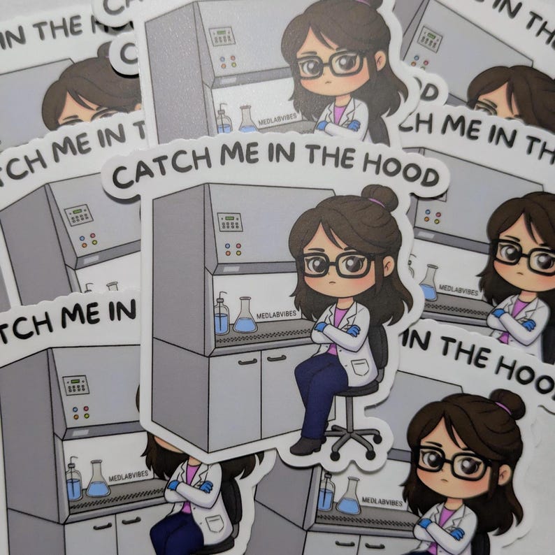 May include: A collection of stickers with a cartoon illustration of a person in a lab coat and glasses, in front of a laboratory hood. The text "CATCH ME IN THE HOOD" is displayed. The stickers are white with a grey background.