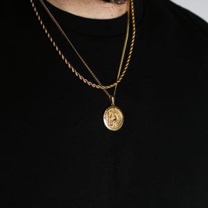 gold saint christopher medal pendant