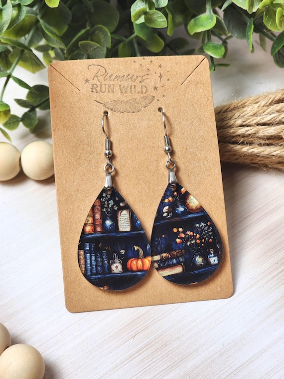 Witchy Book Earrings, Teardrop Bookshelf Dangle Earrings with Halloween Vibes showcasing Books, Potions, Pumpkins and Flowers