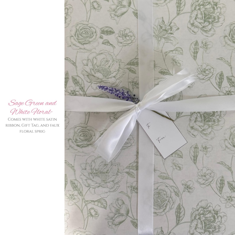 Pode incluir: Um presente embrulhado em papel floral verde s&aacute;lvia e branco, amarrado com uma fita de cetim branca. Uma pequena etiqueta est&aacute; anexada e um raminho floral falso adiciona um toque decorativo. O papel de embrulho apresenta um padr&atilde;o floral repetido.