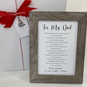 May include: A framed print with a poem about a father. The poem reads "For My Dad" and includes the text "What do you give to the guy who has given you the whole world?" and "Merry Christmas! Love your daughter, Amanda."