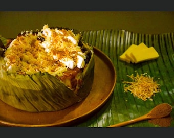 Bibingka-Inspired Burnt Cheesecake • Salted Egg • Toasted Brown Sugar • Toasted Coconut • Queso de Bola Toppings