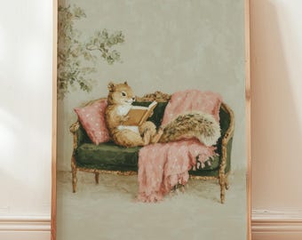 May include: A framed print depicts a squirrel reading a book while lounging on a green antique sofa. The squirrel is nestled among pink pillows and a pink blanket with white polka dots. The artwork has a vintage, whimsical aesthetic.