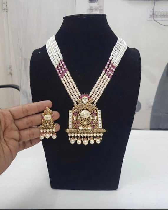 Buy online Rose Gold Plated Studded Floral Design Pendant Earrings Set With  Chain from Sets for Women by Saraf Rs Jewellery for ₹499 at 80% off | 2024  Limeroad.com
