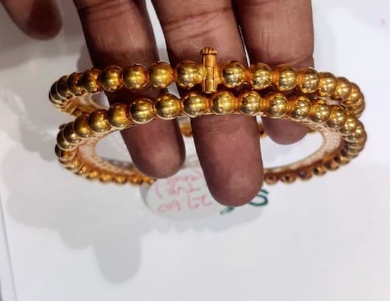 Solid gold kada sale