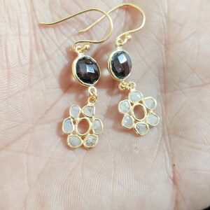 Hoop earring with polki diamond and smokey quartz stone in Sterling Silver with floral design that gives you eye catching look!