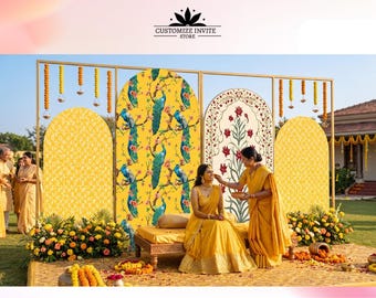 May include: A wedding ceremony setup with yellow and gold decor. The backdrop features peacock and floral patterns. Two women in yellow attire are the focus, with the text "CUSTOMIZE INVITE STORE" at the top.