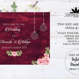 May include: A burgundy wedding invitation template with a watercolor background, pink flowers, and silver ornaments. The text reads "Welcome to the Wedding of Aarushi & Adilya 25th December 2021". The template is fully editable and available in two sizes: 18x24 and 24x36 inches.  You can print at home, get a digital copy, or use a local print vendor.  Edit online and download instantly.