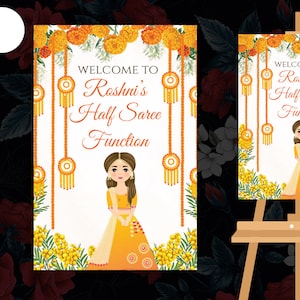May include: A white sign with a floral border and the text "Welcome to Roshni's Half Saree Function". A cartoon illustration of a woman wearing a yellow and orange half saree is in the center of the sign.